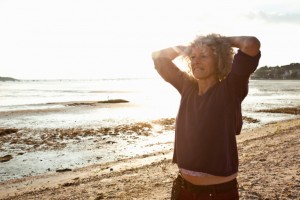 Mature woman enjoying beach